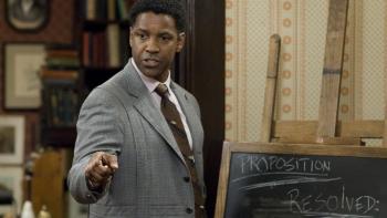 Man in front of a chalkboard