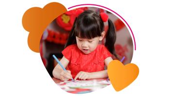 young Asian girl coloring