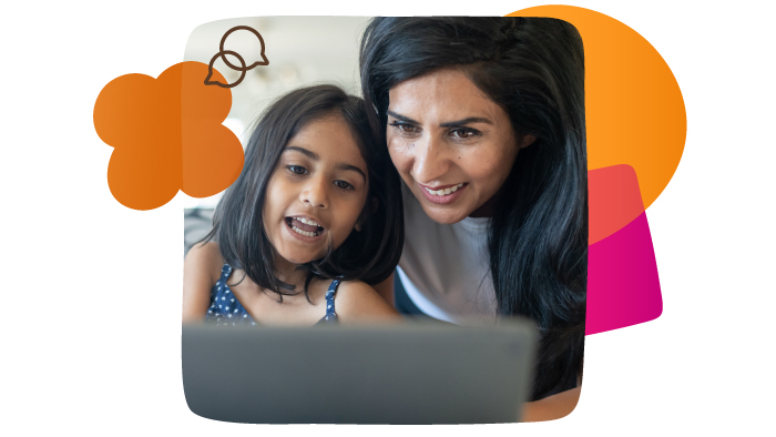 woman looking at a device with a child